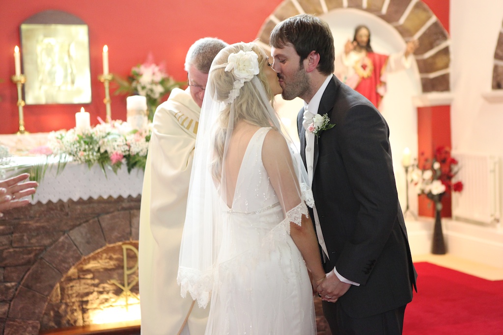 wedding kiss the bride church